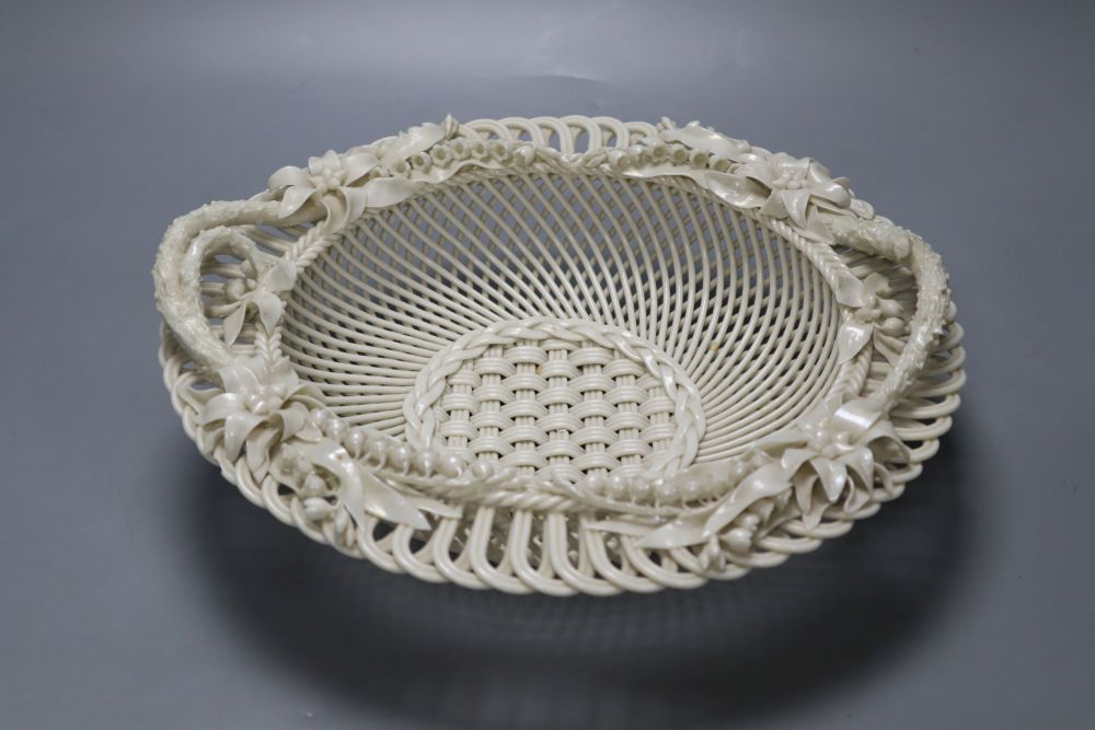 A Belleek basket, stamped Belleek Co Co. Fermanagh